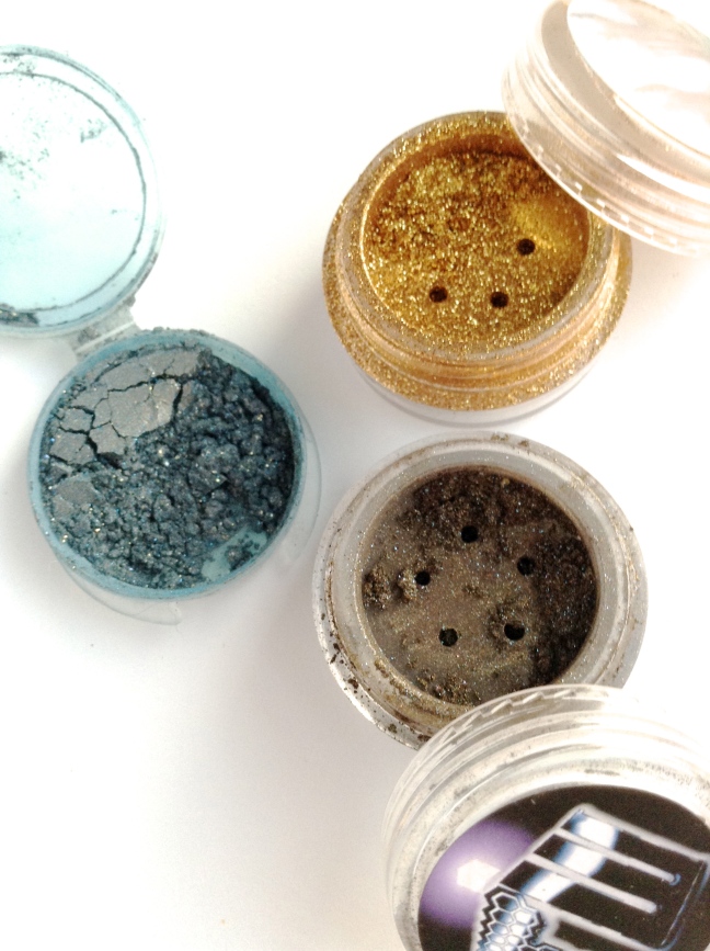 (clockwise) Geek Chic Loose Eyeshadows in One Ring, We are Coming, and Bigger on the Inside